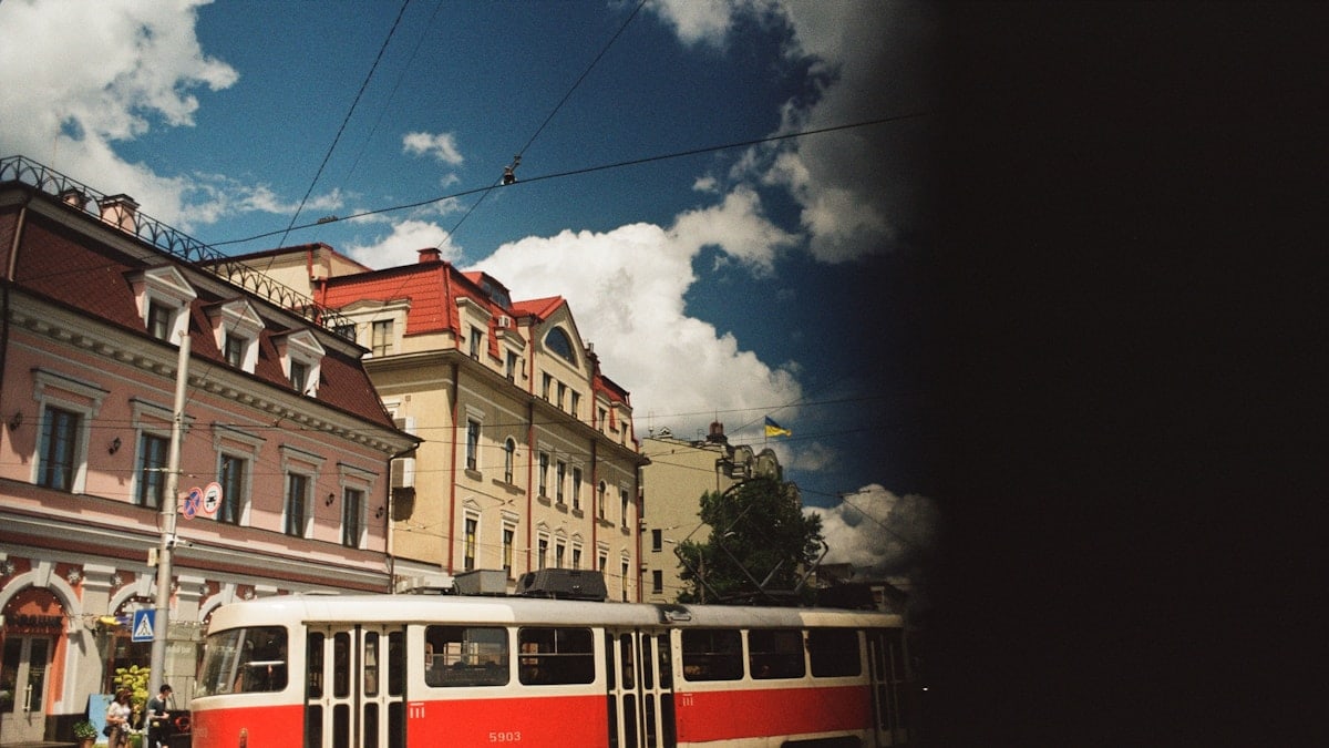 City street with tram and buildings, simulating visual field loss